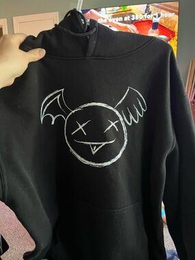 Black Graphic Pullover Hoodie with White Skull Wing Print